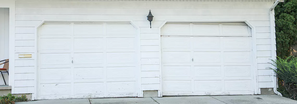 Roller Garage Door Dropped Down Replacement in Poinciana, FL