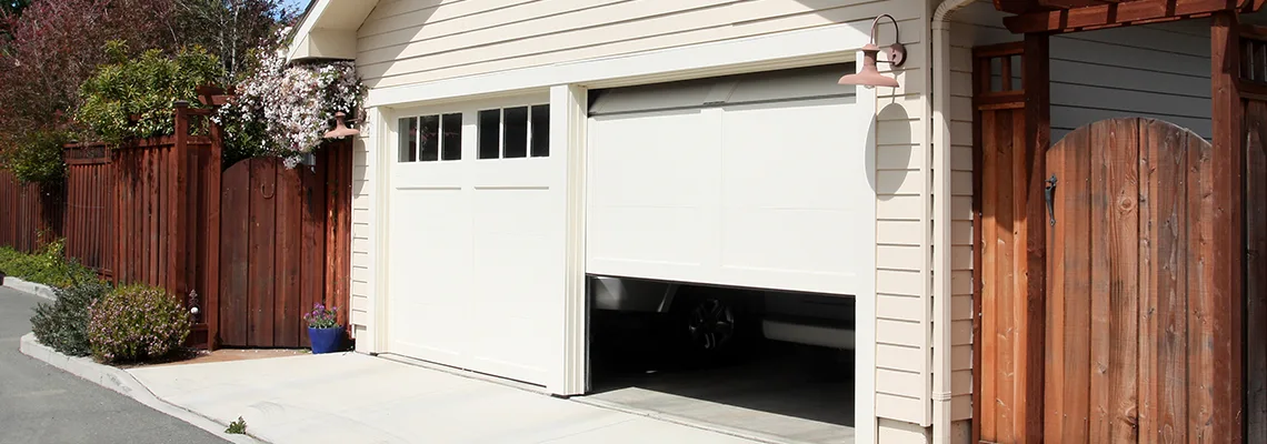 Fix Metal Garage Door Jerking in Poinciana, Florida